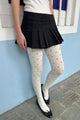 White with Black Polka Dots